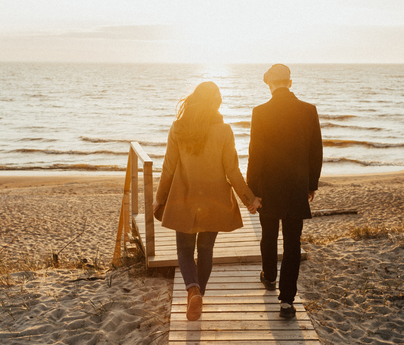 Couple walking on the beach